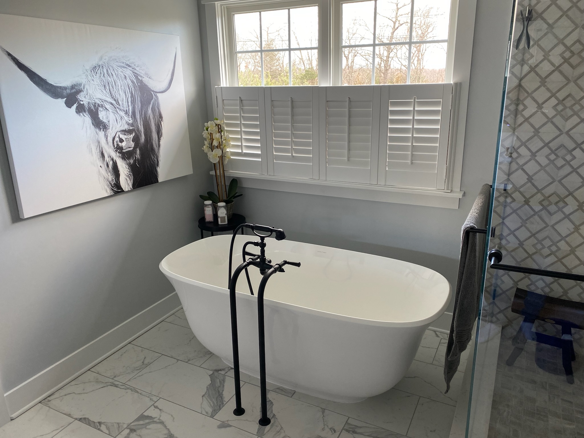 Bathroom renovation with stand alone tub and hardware